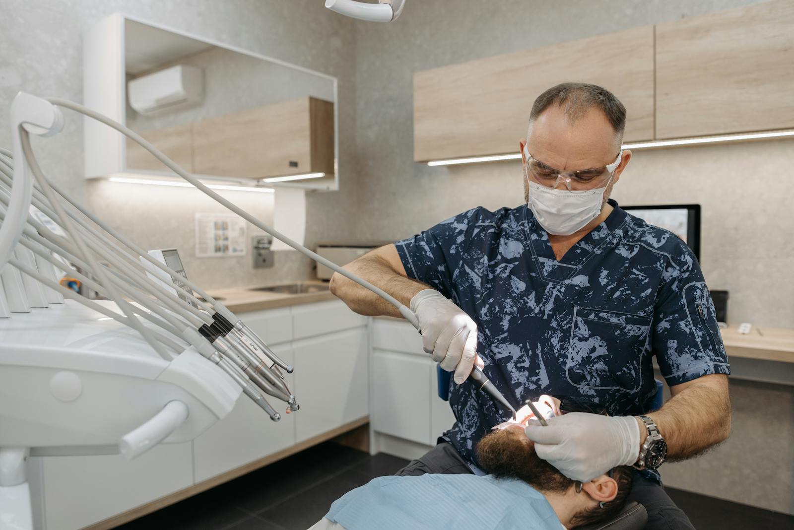 Dental consultant and clinician reviewing care and operations